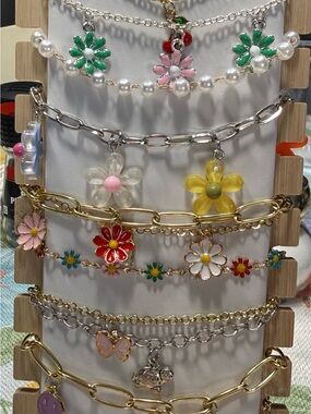 Floral Multi-Color Charm Bracelets.
Sold individually